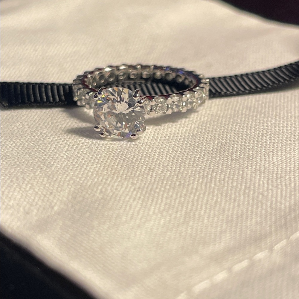 Beautiful Sterling silver sapphire cubic zirconia size 6 single row of diamonds